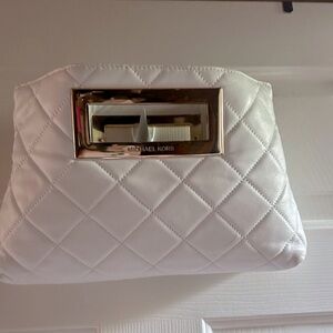 Beautiful white MK cushion Clutch
